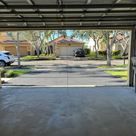Rent this 3 bed apartment on 1542 Presidio Drive in Weston, FL 33327