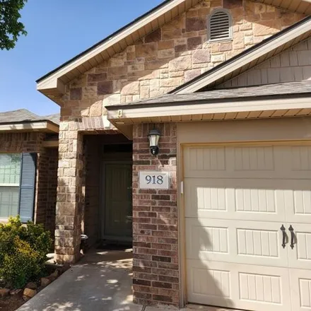 Rent this 4 bed house on Nolan Ryan Drive in Midland, TX 77906