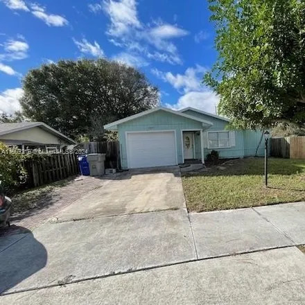 Rent this 4 bed house on 1681 20th Ave Southwest in Florida Ridge, FL 32962