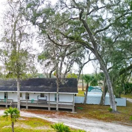 Buy this 4 bed house on 8590 Northwest 50th Avenue in Levy County, FL 32626