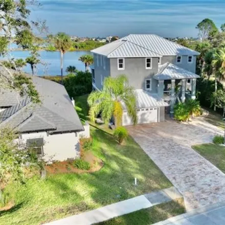 Buy this 5 bed house on 331 Riverwalk Drive South in Painters Hill, Flagler County