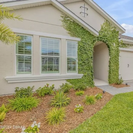 Buy this 4 bed house on 6264 West Fallsgrove Lane in Port Orange, FL 32128