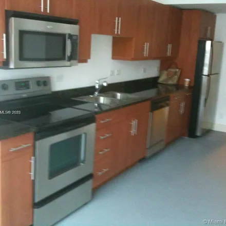 Rent this 1 bed apartment on Wells Fargo in 100 East Flagler Street, Torch of Friendship
