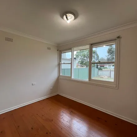 Rent this 3 bed apartment on 35 Mubo Crescent in Holsworthy NSW 2173, Australia