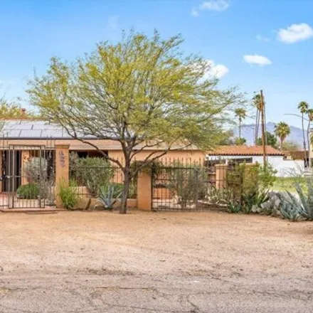 Rent this 3 bed house on North Alvernon Way in Tucson, AZ 85716