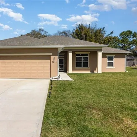 Buy this 4 bed house on 1017 Durango Street Southeast in Palm Bay, FL 32909