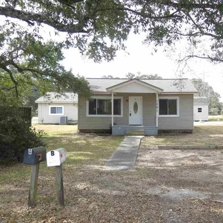 Buy this 4 bed house on 1225 Concordia Boulevard in Brent, FL 32505