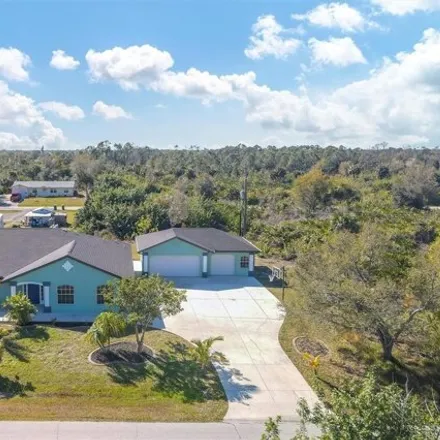Buy this 5 bed house on 10467 Alexandria Avenue in Charlotte County, FL 34224