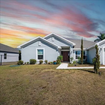 Buy this 4 bed house on 867 Southwest Jaslo Avenue in Port Saint Lucie, FL 34953