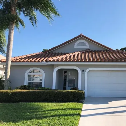 Rent this 3 bed house on 4389 Southeast Scotland Cay Way in Port Salerno, FL 34997