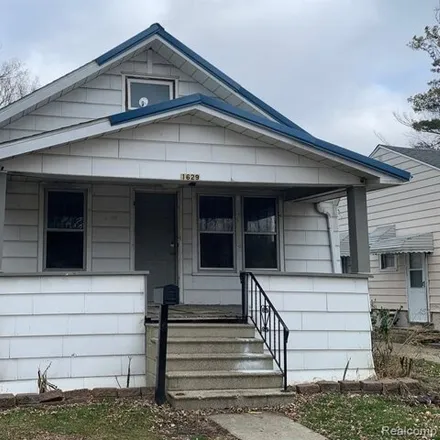 Buy this 2 bed house on 1647 Wisconsin Avenue in Flint, MI 48506