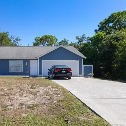 Buy this 3 bed house on 1314 Southwest Granville Avenue in Port Saint Lucie, FL 34953