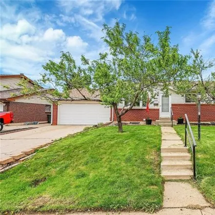 Buy this 4 bed house on 1538 Phillips Drive in Northglenn, CO 80233