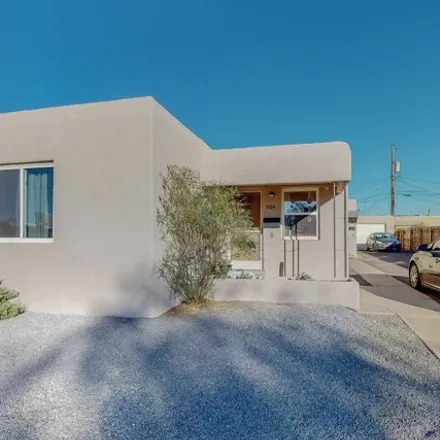 Buy this 4 bed house on 6140 Zuni Road Southeast in Albuquerque, NM 87108