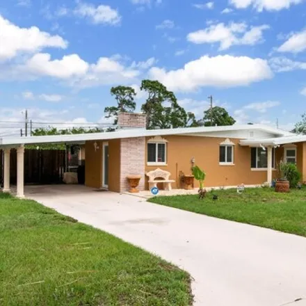 Buy this 3 bed house on 382 Northeast Shady Lane in Saint Lucie County, FL 34952