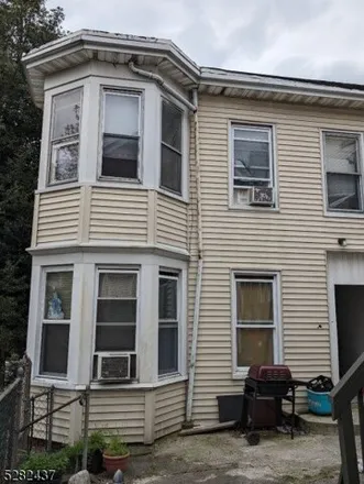 Buy this 6 bed house on 97 Garfield Avenue in Paterson, NJ 07522