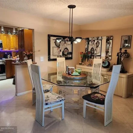 Buy this 3 bed condo on 3347 Cocoplum Circle in Coconut Creek, FL 33063