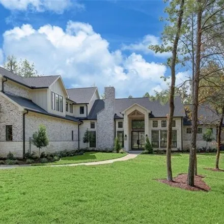 Buy this 5 bed house on 10354 Hunter Creek Lane in Conroe, TX 77304