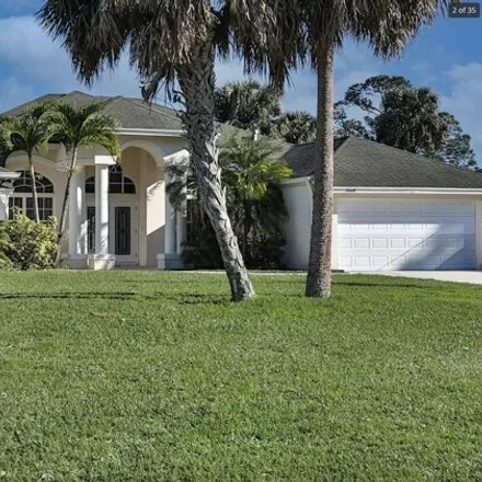 Buy this 3 bed house on 2674 Southwest Ace Road in Port Saint Lucie, FL 34953