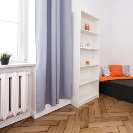 Rent this 7 bed room on Alpha in Targowa 70, 03-729 Warsaw