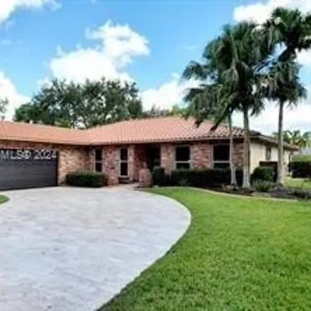 Image 2 - 10027 Ramblewood Drive, Coral Springs, FL 33071, USA - House for sale