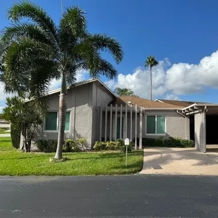 Rent this 3 bed condo on Wildflower Lane in Villages of Oriole, Palm Beach County