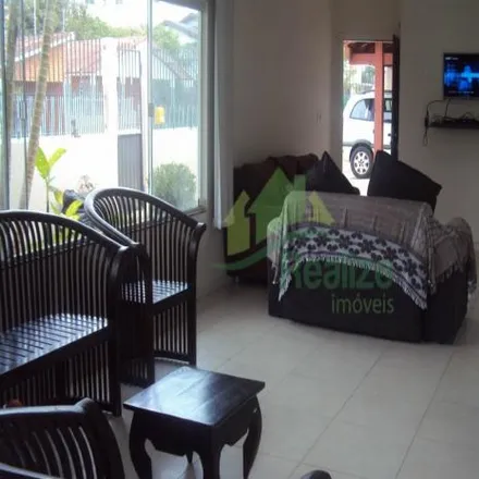 Rent this 4 bed house on Posto Canasvieiras in Avenida das Nações, Canasvieiras