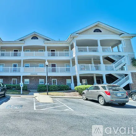 Rent this 2 bed apartment on 5751 Oyster Catcher Dr