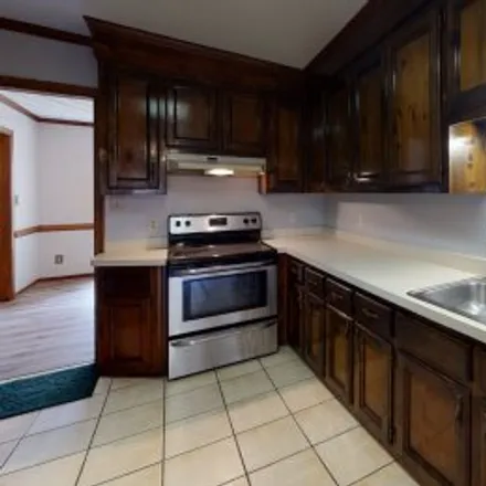 Rent this 3 bed apartment on 4306 Mountainleaf Court in Holland, Virginia Beach