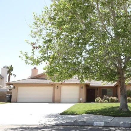 Rent this 4 bed house on 2898 Avenue L 2 in Lancaster, CA 93536
