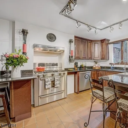 Buy this 3 bed townhouse on 39 Magnolia Avenue in Bergen, Jersey City
