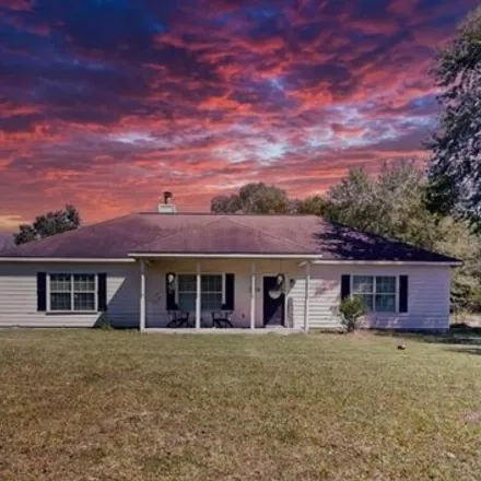 Buy this 4 bed house on 3200 Timber Hollow Road in Hardin County, TX 77625
