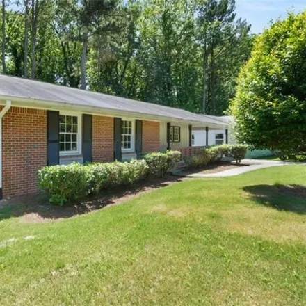Buy this 4 bed house on 3237 Moss Oak Drive in Doraville, GA 30340