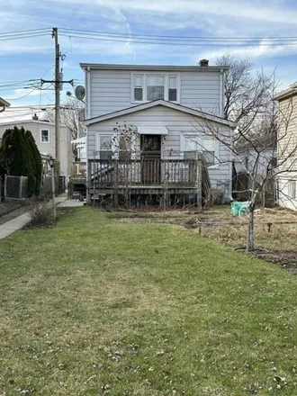 Buy this 4 bed house on 3228 North Opal Avenue in Chicago, IL 60634