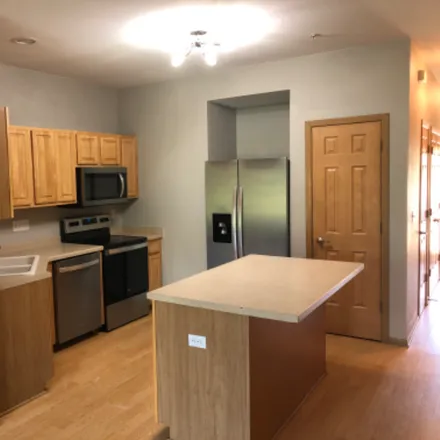 Rent this 2 bed condo on 6865 99th Pl