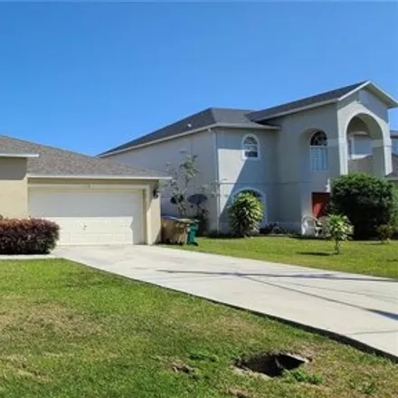 Rent this 3 bed house on 137 Aurelia Court in Poinciana, FL 34758