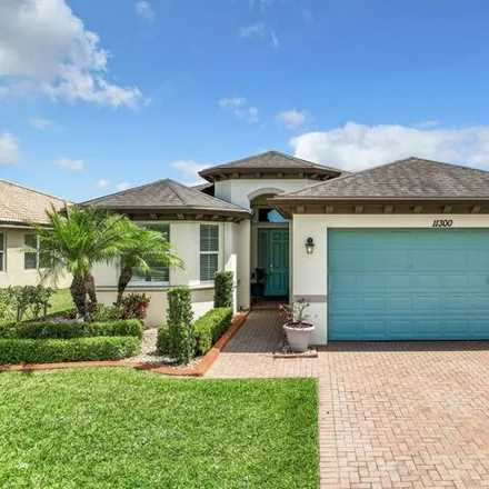 Buy this 3 bed house on 11300 Southwest Wyndham Way in Port Saint Lucie, FL 34987