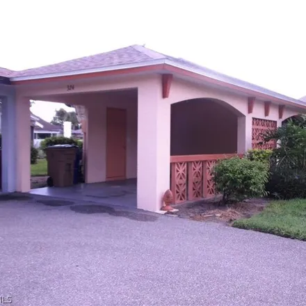 Rent this 2 bed house on 241 Joel Boulevard in Lehigh Acres, FL 33936