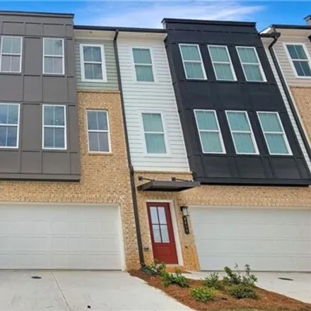 Rent this 3 bed townhouse on unnamed road in Atlanta, GA 30369