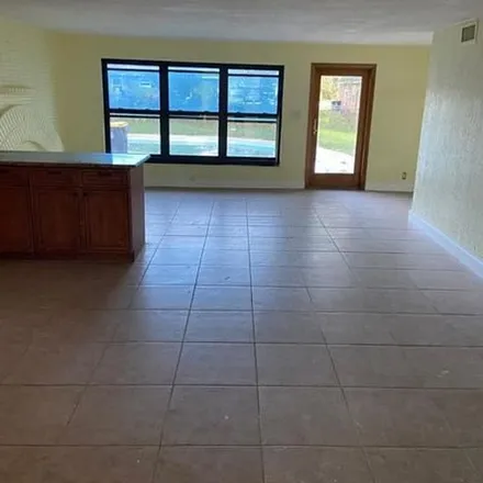 Rent this 4 bed apartment on 4578 Southwest 24th Avenue in Avon Park, Dania Beach