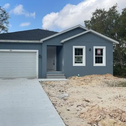 Buy this 3 bed house on 1406 Teal Drive in Polk County, FL 34759