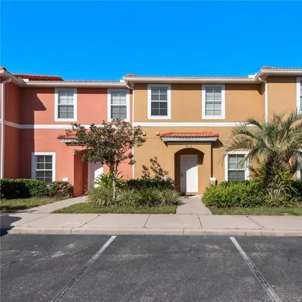 Buy this 2 bed townhouse on 3022 Bird of Paradise Lane in Four Corners, FL 34747