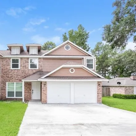Rent this 4 bed house on 2557 La Salle Avenue in Conroe, TX 77304