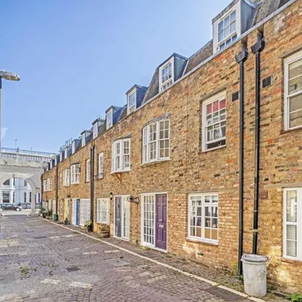 Rent this 3 bed apartment on Comeragh Mews in London, W14 9HA