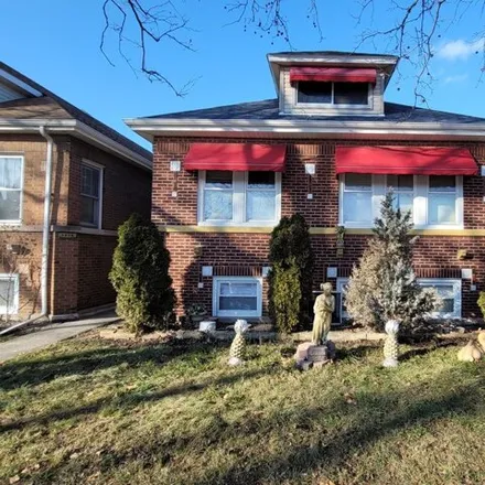 Buy this 7 bed house on 4624 West Deming Place in Chicago, IL 60639