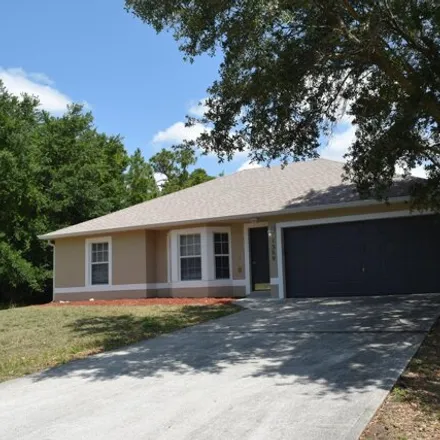 Rent this 3 bed house on 1365 Danbury Street Southwest in Palm Bay, FL 32908