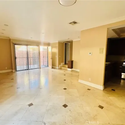 Rent this 3 bed apartment on Seville Avenue in Huntington Park, CA 90255