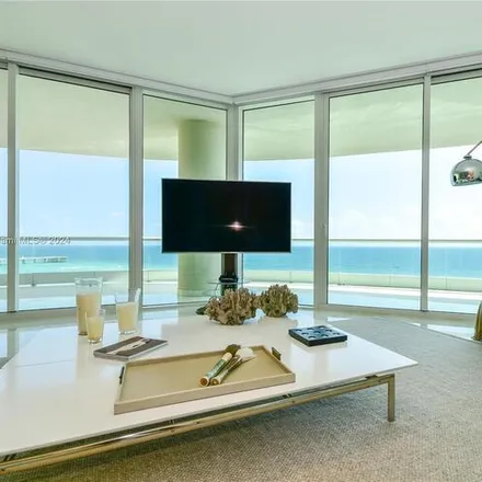 Rent this 4 bed condo on 16051 Collins Ave