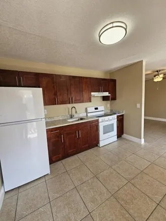 Rent this 2 bed apartment on 1204 West Blue Heron Boulevard in Riviera Beach, FL 33404