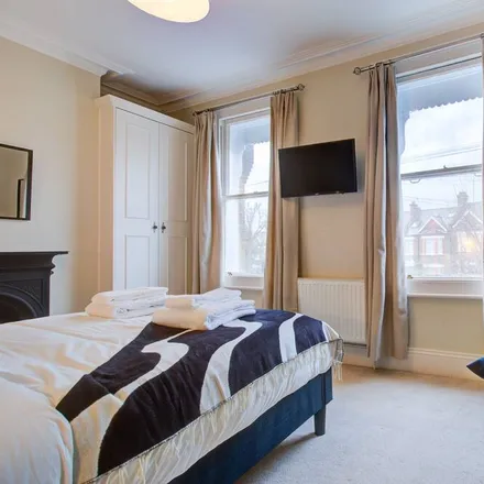 Rent this 4 bed house on London in SW20 8PF, United Kingdom